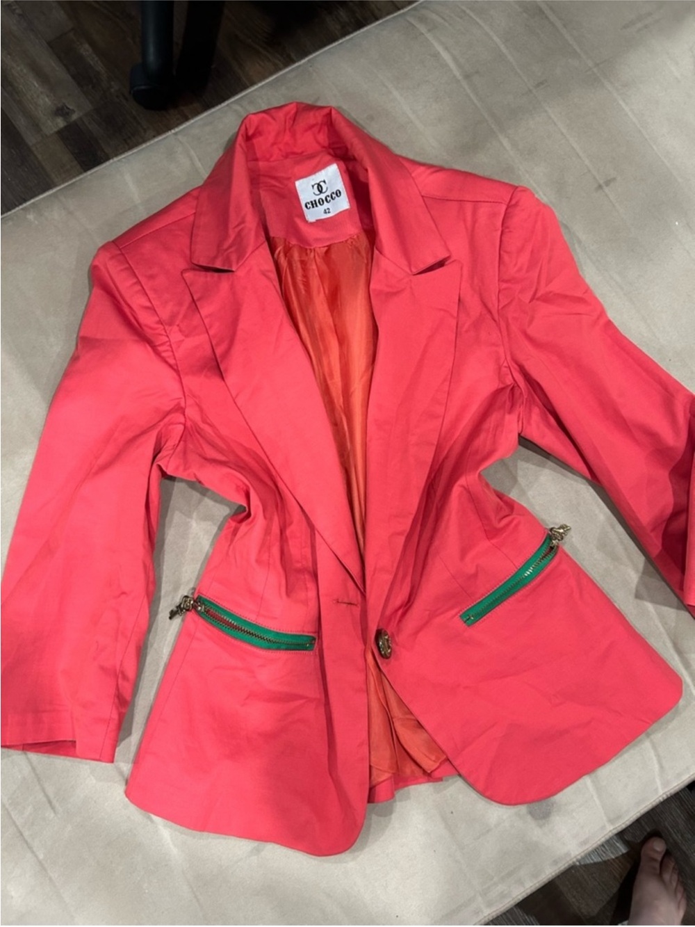chic Coral-Pink Blazer with Green Zip Accents